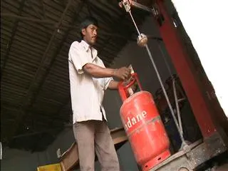 lpg prices revised non subsidy cyllinders to cost more - Sakshi
