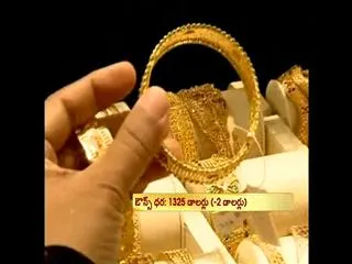 Indian government cuts base import price for gold silver - Sakshi