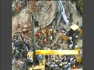 18 killed in Rain triggered building collapses - Sakshi