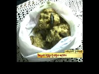 Iron bolt found in Tirupati laddu - Sakshi