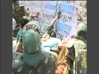 Students thrown stones on police at ncc gate - Sakshi