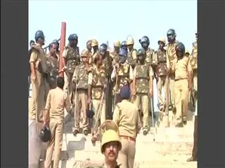 uttar pradesh police lathicharge home guard jawans - Sakshi