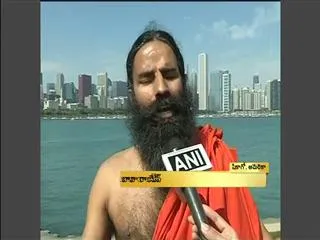 Baba Ramdev to visit US to mark Vivekananda's birth anniversary - Sakshi