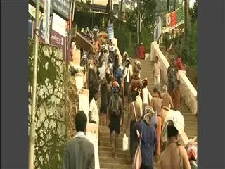 Devotees throng Ayyappa temple for 'Mandala Pooja' - Sakshi