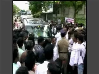 Chappals on minister satrucharla Vijayarama Raju convoy - Sakshi