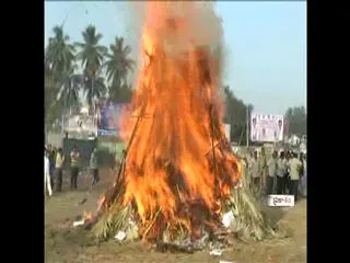 telangana draft bill burnt in bhogi flames - Sakshi