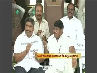 Parliament disrupted over Telangana - Sakshi