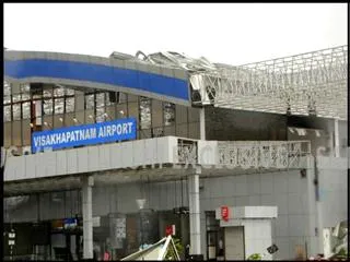 Cyclone Hudhud effect: vizag airport damaged - Sakshi