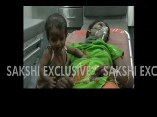 9 Months boy at mother's dead body - Sakshi