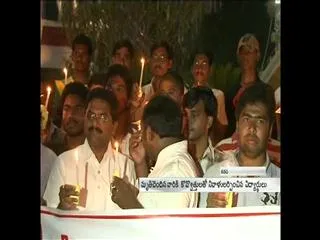 Students take part in a candle light march for on an excursion trip to Himachal Pradesh, - Sakshi