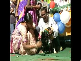 Man conducts Naming ceremony for dogs - Sakshi