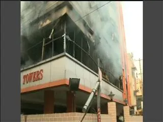 Major Fire Accident at Rukmini Towers, Begumpet - Sakshi