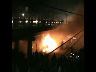 Catches fire under flyover at bhimavaram - Sakshi