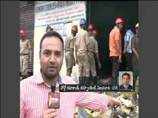 Fire Accident in Oil Company at Vijayawada - Sakshi