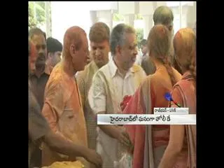 Governor Narasimhan and His Wife Celebrate Holi - Sakshi