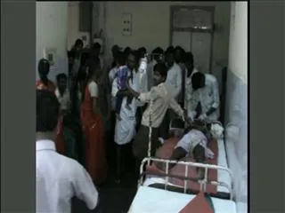 TDP cadre attack on YSRCP cadre with stones - Sakshi