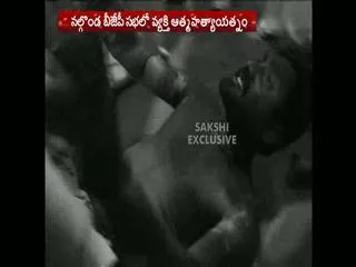 man-tries-to-set-to-fire-himself-at-bjp-public-meeting - Sakshi