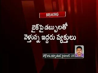 Robbery in Koti bus stand - Sakshi