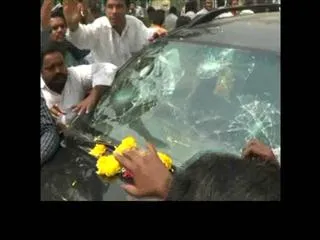TDP followers attacked LB Nagar TDP Candidate R. Krishnaiah - Sakshi