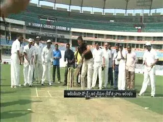 pullela gopichand batting,  vvs laxman bowling - Sakshi