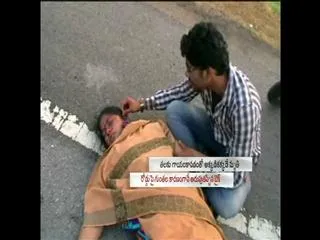 Woman dies after falling from bike - Sakshi