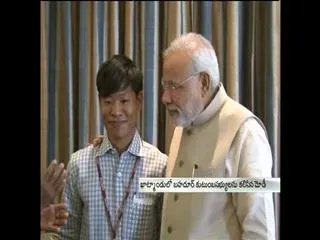 Narendra Modi reunites Nepalese youth with parents after 16 years - Sakshi