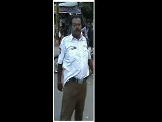 Traffic police drink alcohol in duty - Sakshi
