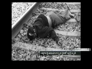 Man found dead near train tracks - Sakshi