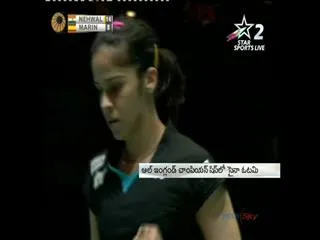 saina-nehwal-loses-to-carolina-marin-in-the-final - Sakshi