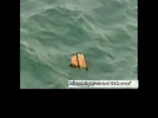 air-asia-flight-door-alleged-to-be-spotted-in-sea - Sakshi
