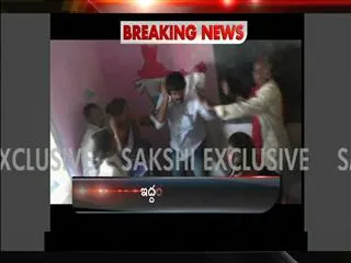 Two students beat up teacher in classroom in front of students - Sakshi
