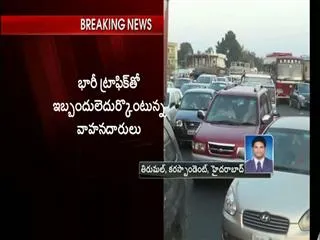heavy-traffic-jam-on-vijayawada-hyderabad-high-way - Sakshi