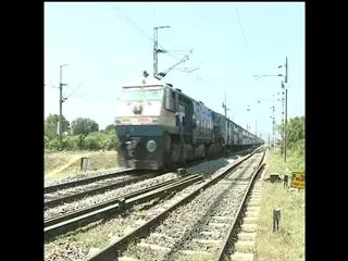 Partial rollback of suburban rail fare hike - Sakshi