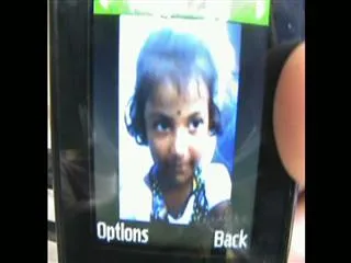 Mental woman pours kerosene, Burns child - Sakshi