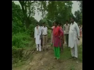 Lady don runs tractor over women in land dispute - Sakshi