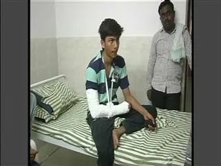 Principal beats up students by iron rod, studens hospitalized - Sakshi