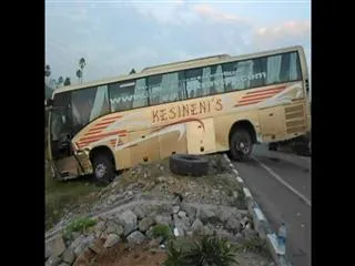 Cleaner dies after lorry  hits Volvo bus - Sakshi