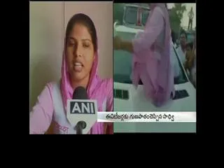 Agra Woman smashes SP leader's car after his guard winked at her - Sakshi
