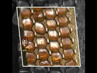 liquor dump found in fish pond - Sakshi