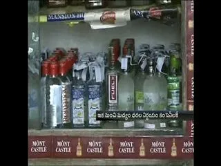 AP Government adopting excise policy of Karnataka - Sakshi