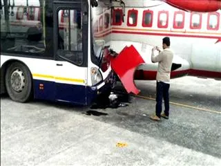 jet airways bus hits air india plane in kolcutta - Sakshi