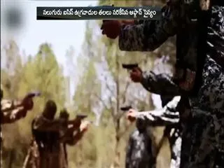 Afghan militia decapitate four ISIS fighters - Sakshi