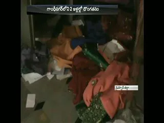 huge robbery in badvel - Sakshi