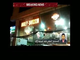 Police arrests Man takes a Harley Davidson bike worth Rs 6 lakh for a test drive - Sakshi