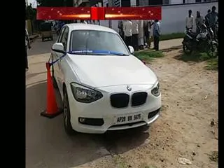 Dead body found in BMW car at bowenpally - Sakshi