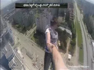 A Man circus feets on 40 Floor Bulilding in Russia - Sakshi