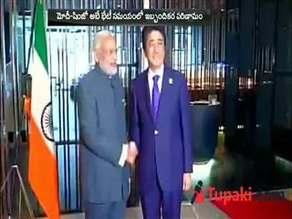 Indian flag upside down at Modi-Abe meet in Kuala Lumpur. - Sakshi