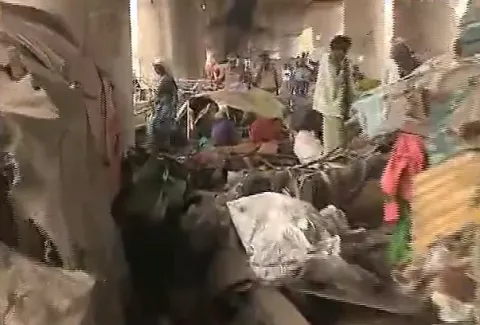railway officers attack on poor people huts in visakhapatnam - Sakshi