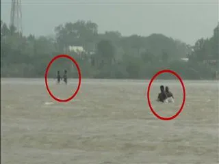 fisherman's are stuck in flooded water in kadapa district - Sakshi