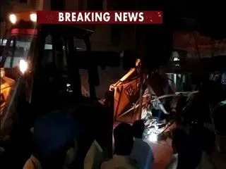 Police collapse ganesh temple in kothapet - Sakshi